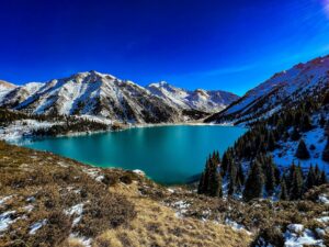 10 Best Places to Visit in Almaty, Kazakhstan (2026 Travel Guide) 4 Turquoise waters of Big Almaty Lake, a must-see Almaty tourist attraction in Kazakhstan places to go in 2026